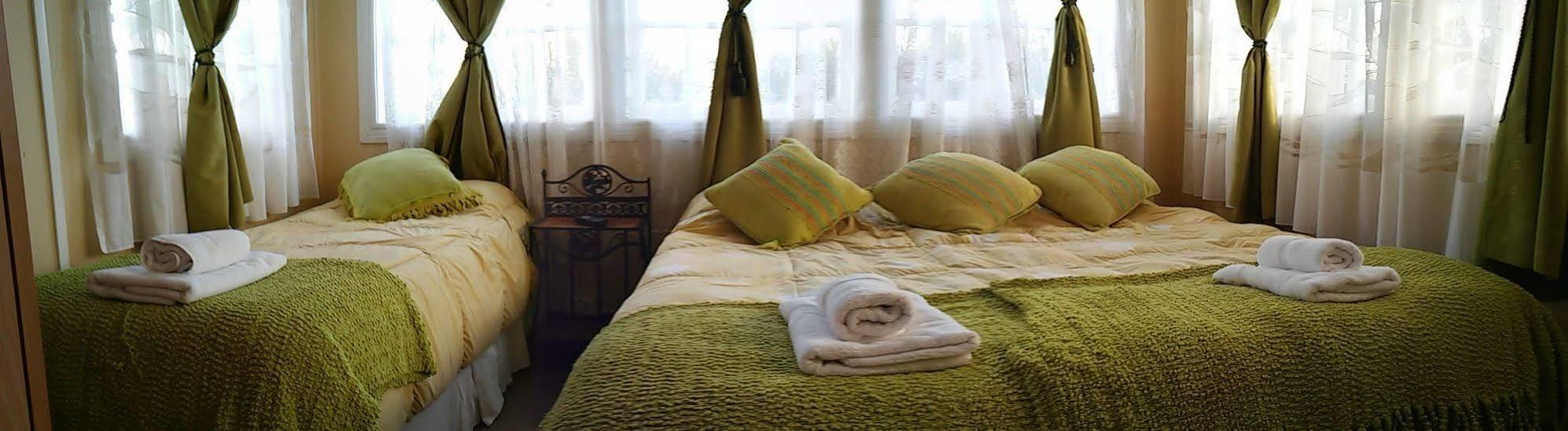 Hostal Y Cabanas Ainil Punta Arenas Exterior foto