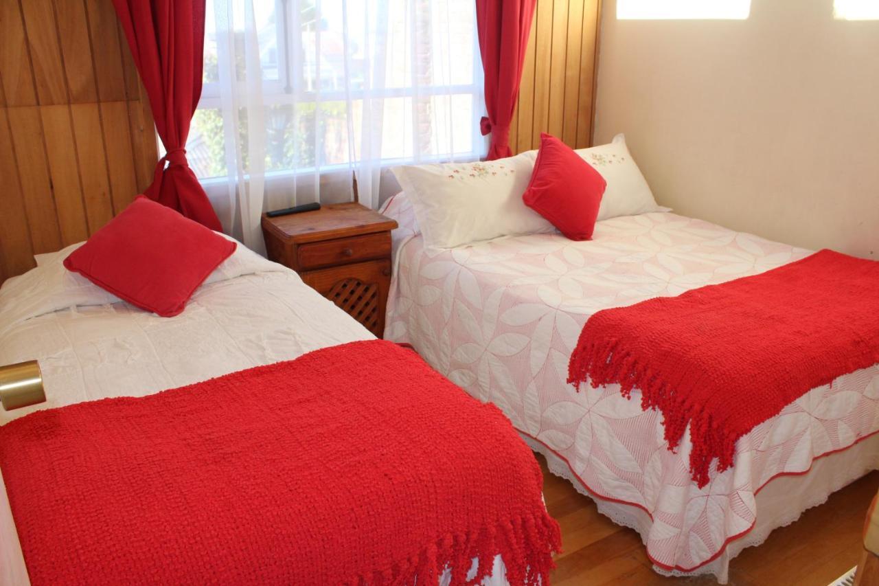 Hostal Y Cabanas Ainil Punta Arenas Exterior foto
