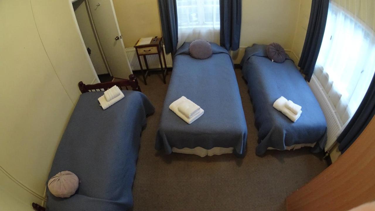 Hostal Y Cabanas Ainil Punta Arenas Exterior foto