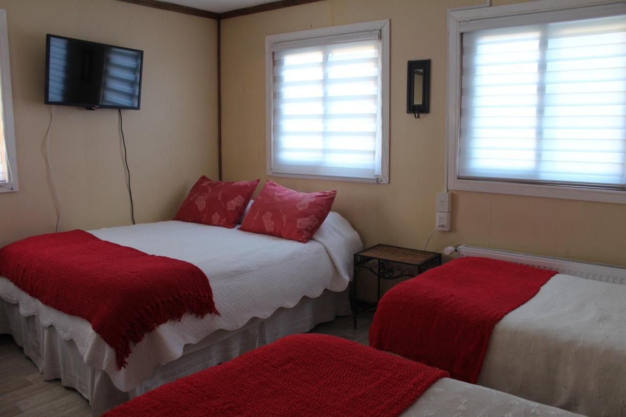 Hostal Y Cabanas Ainil Punta Arenas Exterior foto